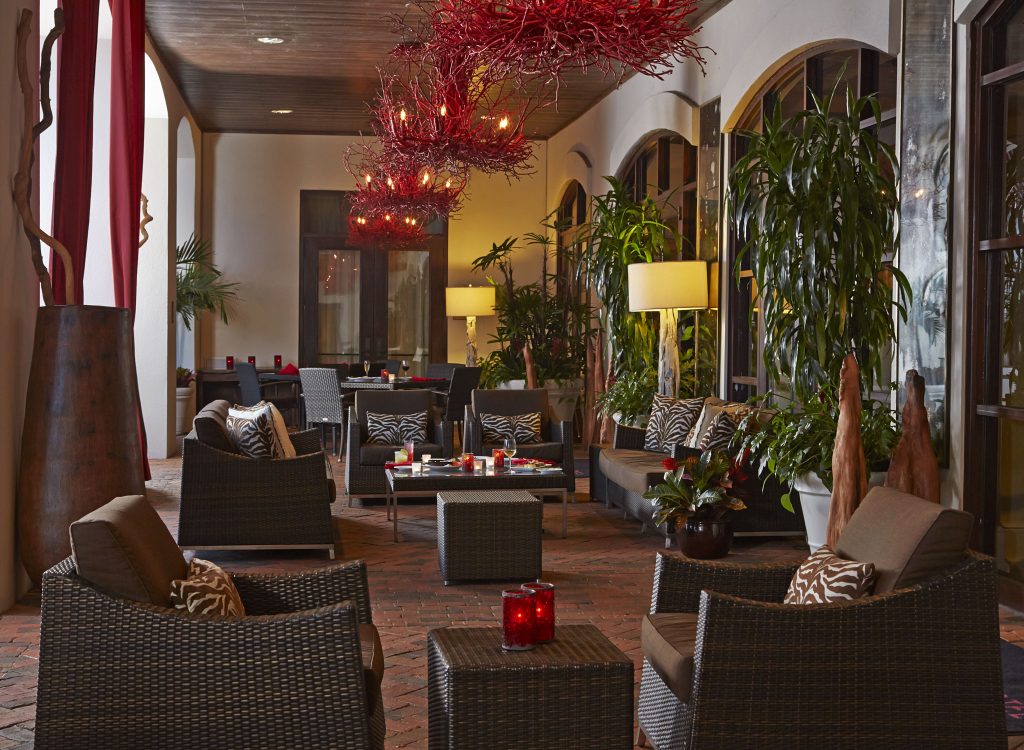 Beautiful outdoor patio of Lakeside Bar + Grill for an unforgettable dining experience in Orlando.