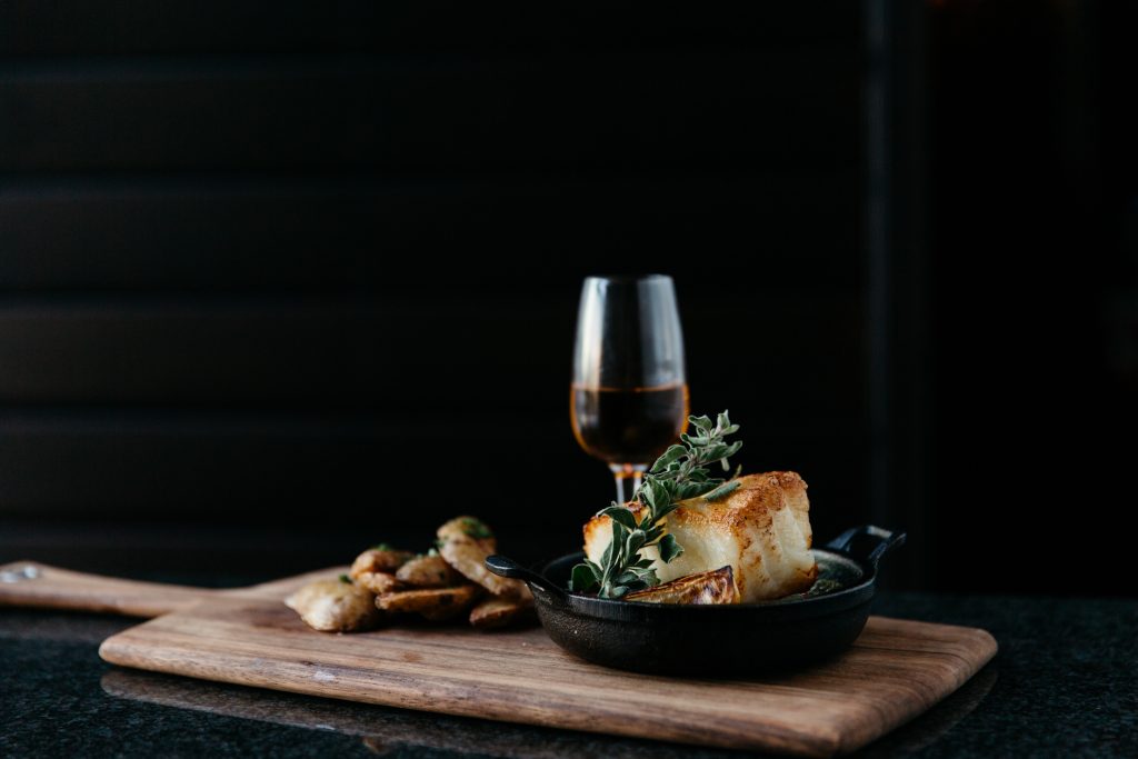 Fish dinner and a glass of wine